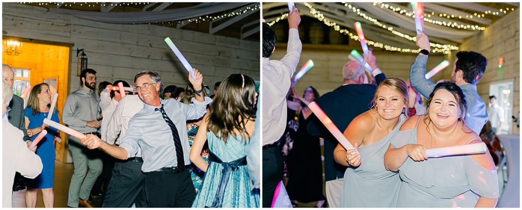 Guests at wedding reception with glow sticks