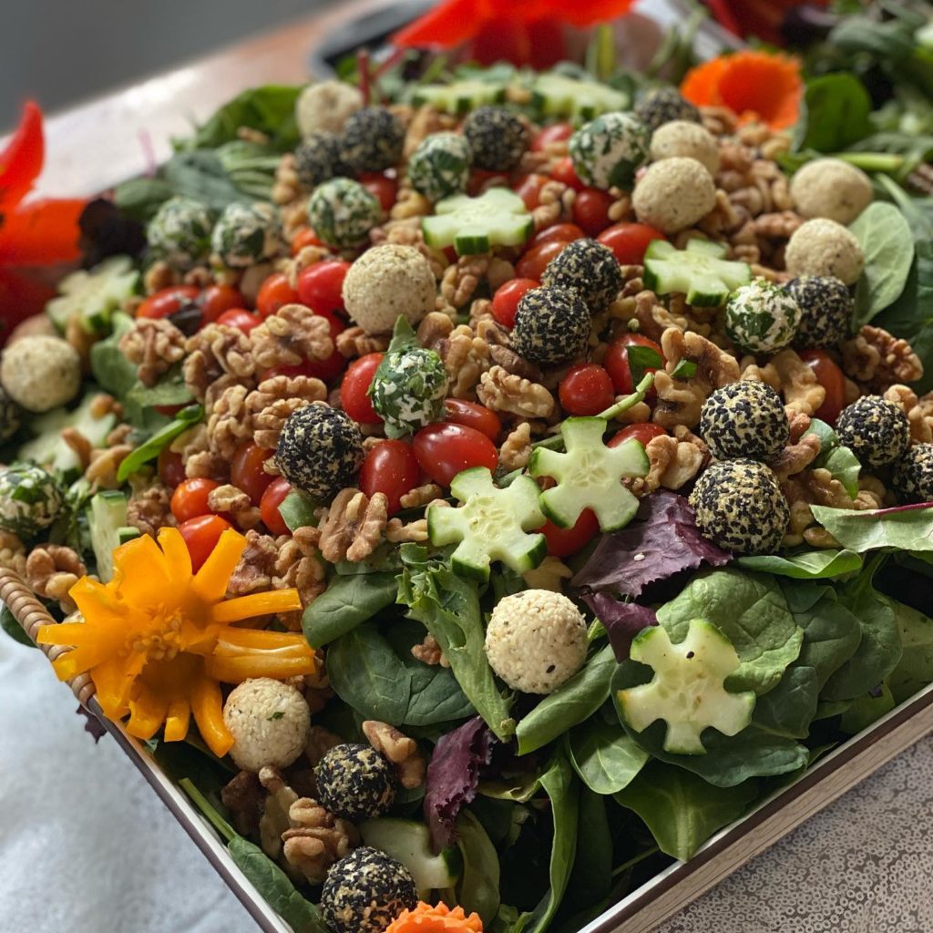 A colorful decorative salad - made by wedding caterer - Sweet Magnolia Catering