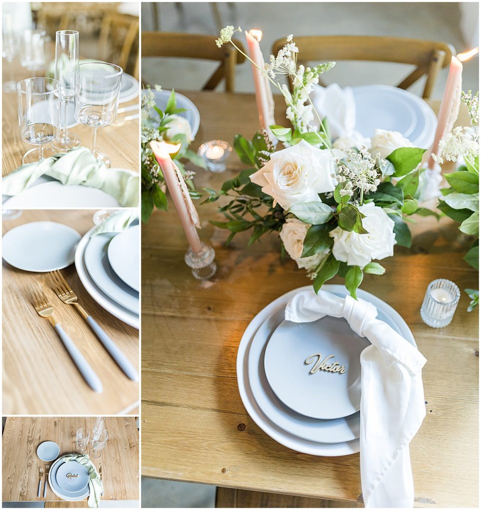 Wedding table decor with baby blue plates, delicate florals, ivory napkin and gold name plates