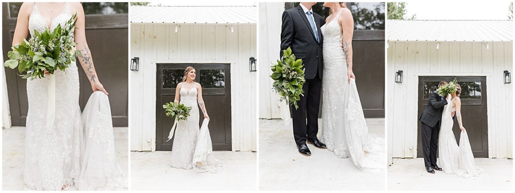Bride wearing her hair up in a white dress holding a greenery bouquet, outside a white building at Koury Farms