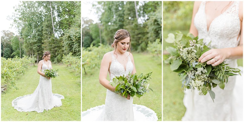 Bride with a greenery bouquet in the grounds of Koury Farms