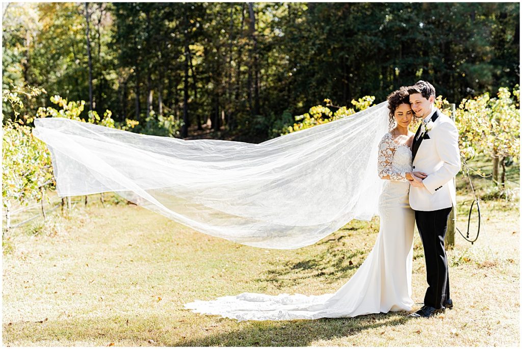 Bride and groom in the grounds for Koury Farms, North Georgia Vineyard wedding venue