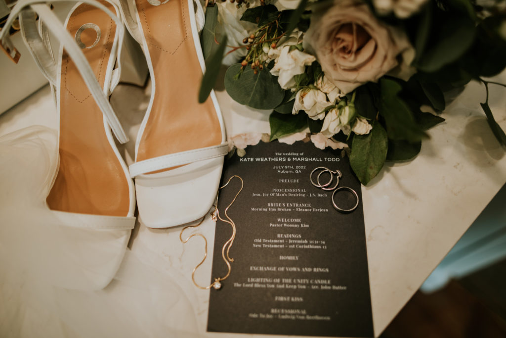 Wedding details including shoes, invitations and flowers.