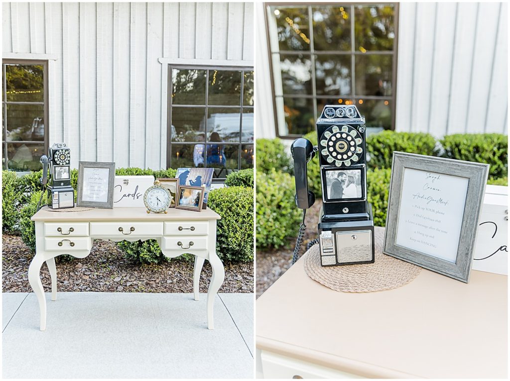 Unique guest book idea, vintage phone on a ornate table with pictures a card box and a clock