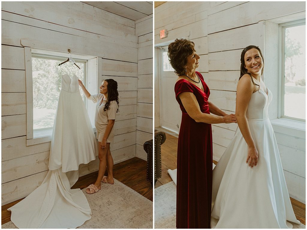 Bride getting helped into her dress by her mother