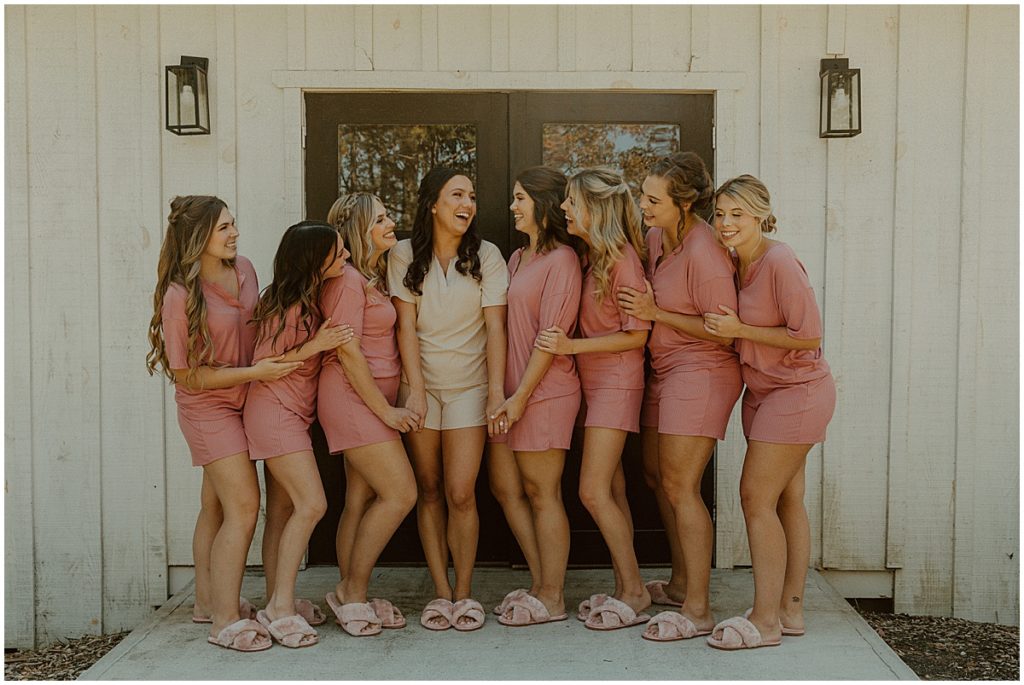 bride with bridesmaids in pink pjs