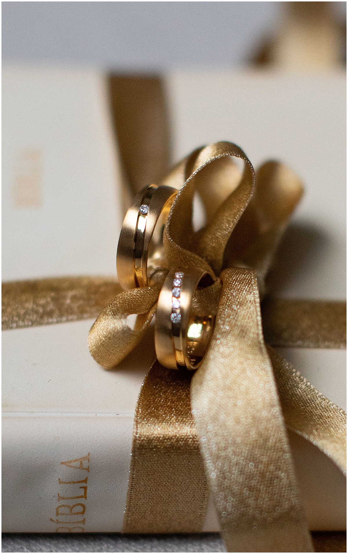 Golden wedding anniversary celebration with rings on a present