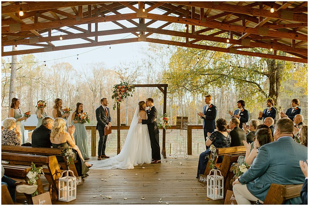 wedding ceremony at the covered pavilion Koury Farms