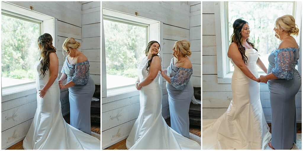 bride with mother helping her into her dress