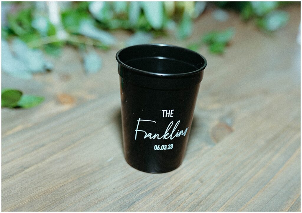a wedding cup party favor with the details