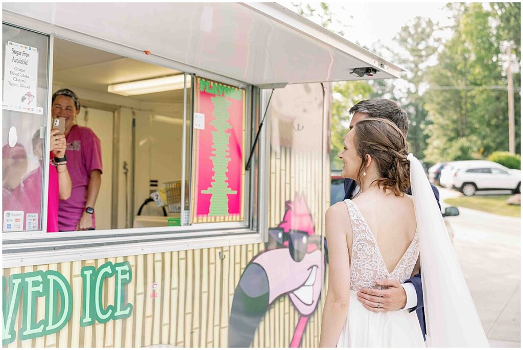 bride and groom at shaved ice truck