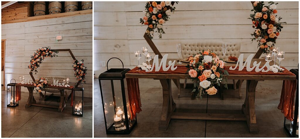 Sweetheart table with Mr and Mrs sign, florals, candles and lanterns
