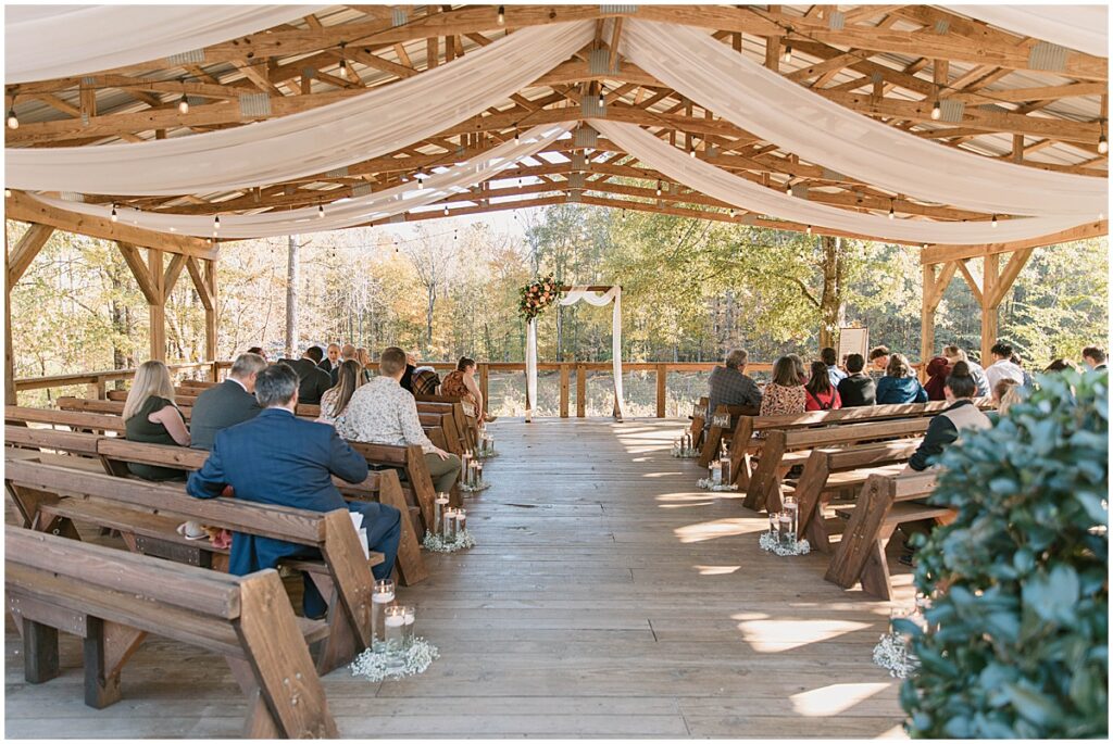 Wedding ceremony under the covered pavilion at Koury Farms