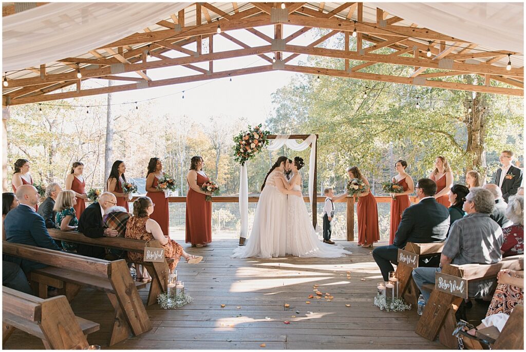 Brides first kiss at LGTBQ+ Friendly wedding venue in North Georgia