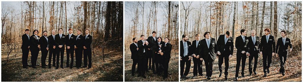 Groom with groomsmen wearing black suits in the forest area of Koury Farms wedding venue in North Georgia