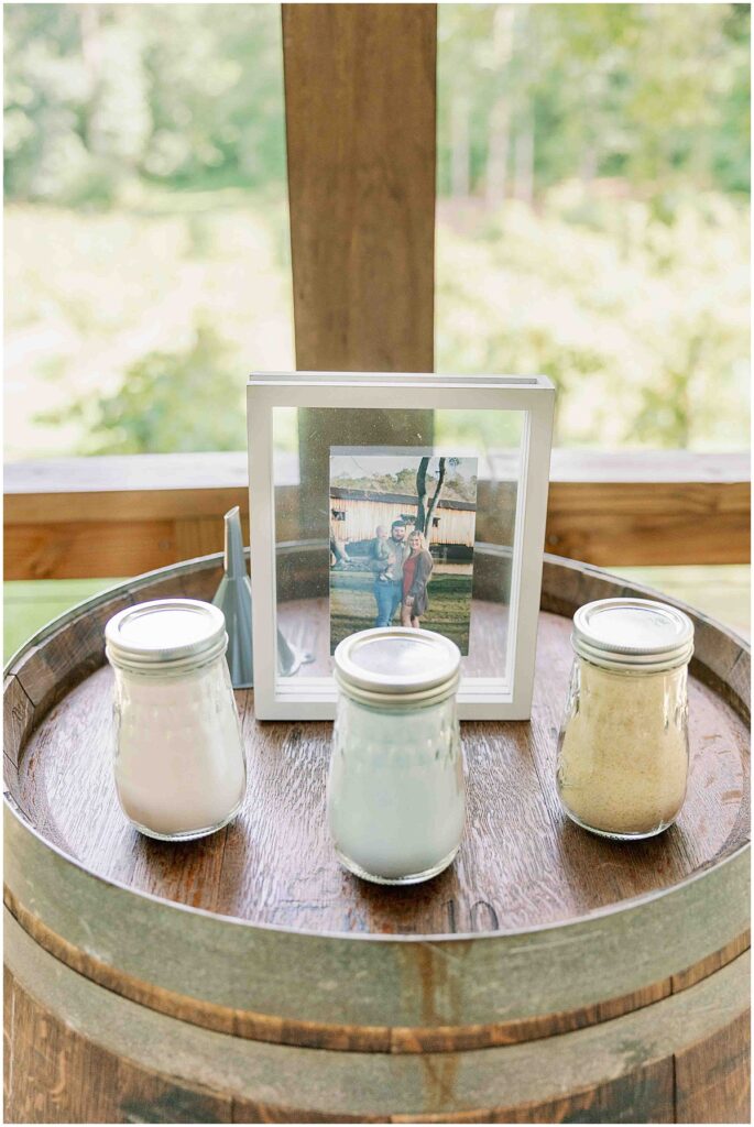 Sand in glass jars ready for unity wedding ceremony at Koury farms