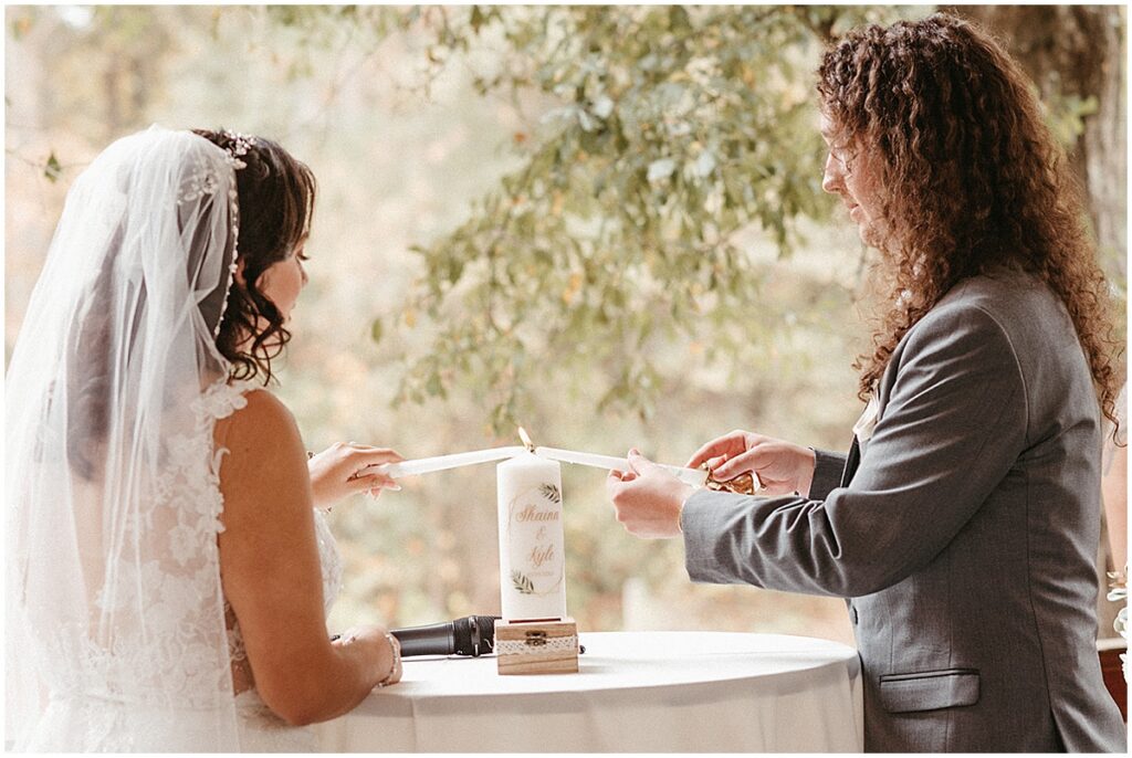 Unity candle at wedding ceremony at Koury Farms