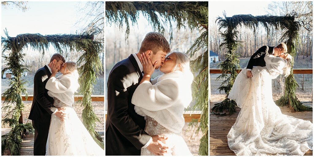 Bride and groom kissing after outdoor winter wedding ceremony at koury farms