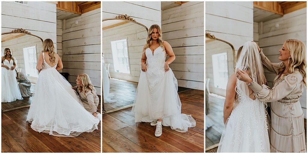 Bride getting ready in her dress with her mother adjusting her veil