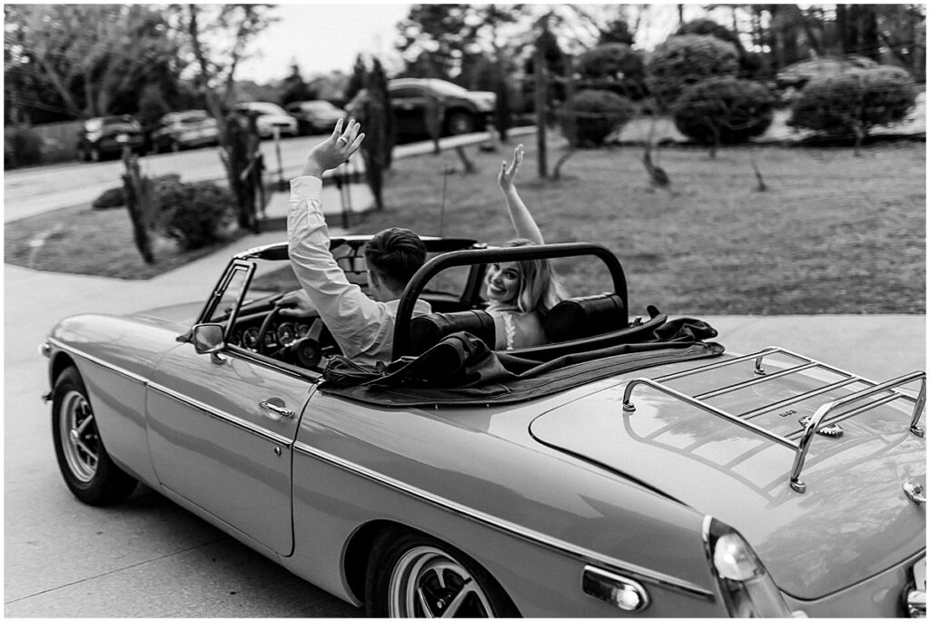 Bride and groom driving off from wedding reception at Koury Farms