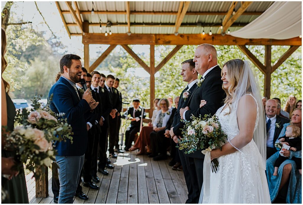 Bride and groom at wedding ceremony at koury farms