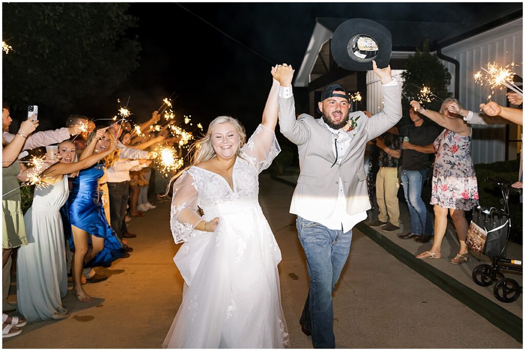 Bride and groom wedding exit with sparklers