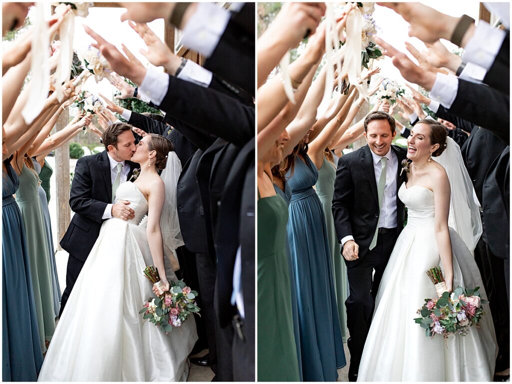 Bride and groom under wedding arch of the wedding party