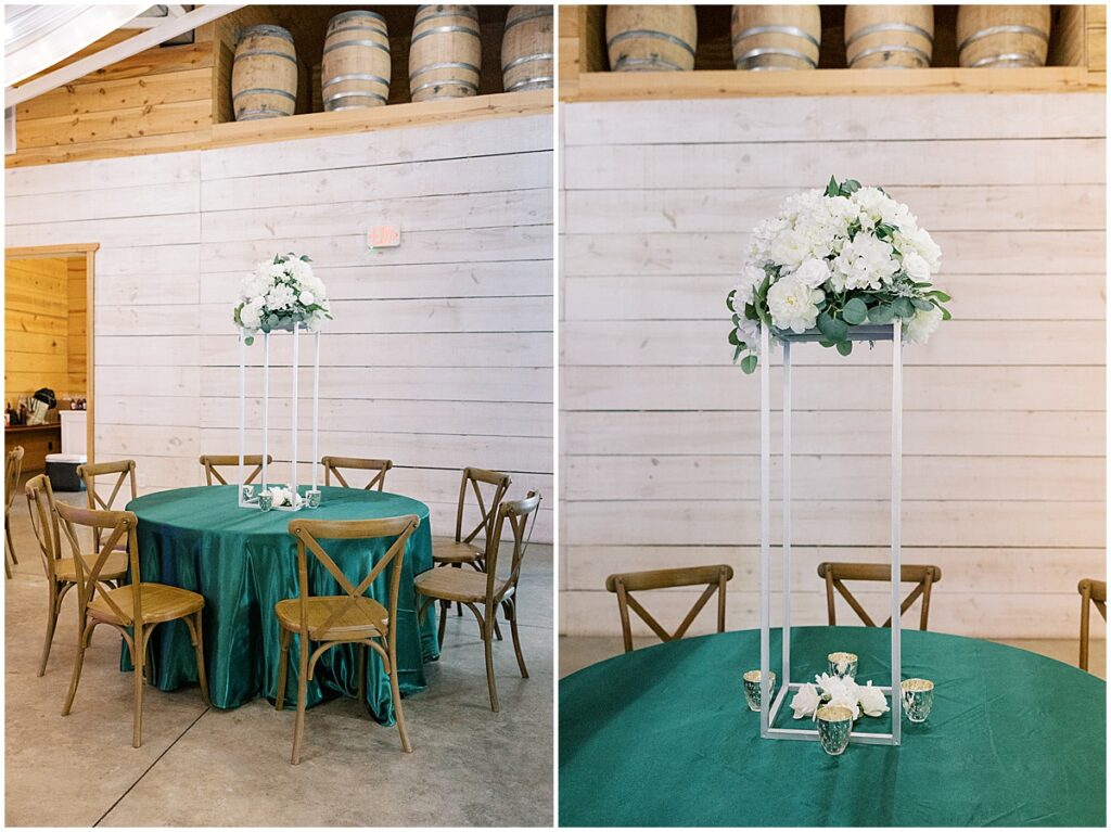 Emerald green table linens which white florals at Koury Farms