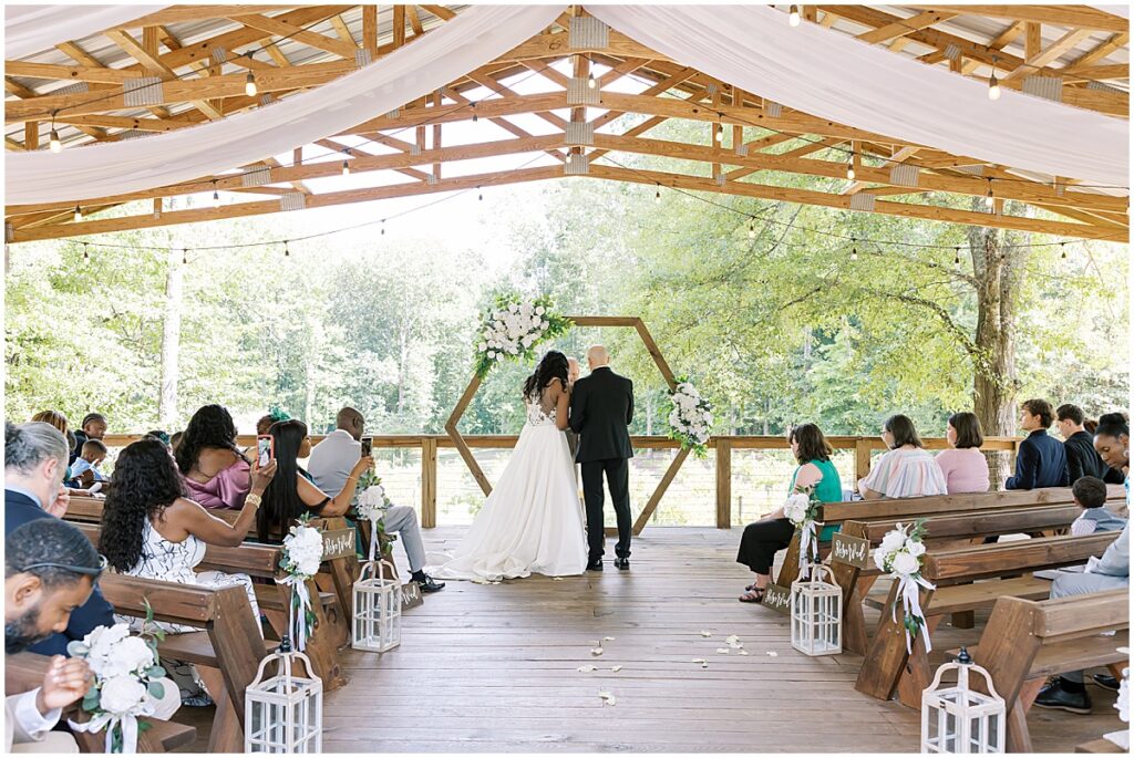 Wedding ceremony at the covered pavilion at Koury Farms