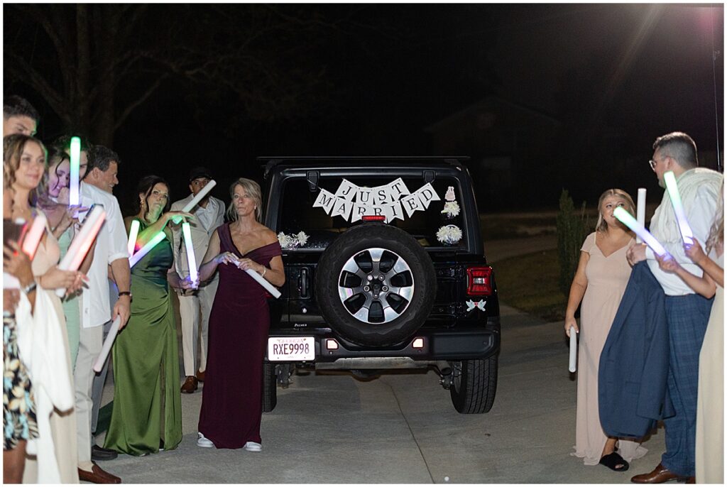 Wedding car with just married banner