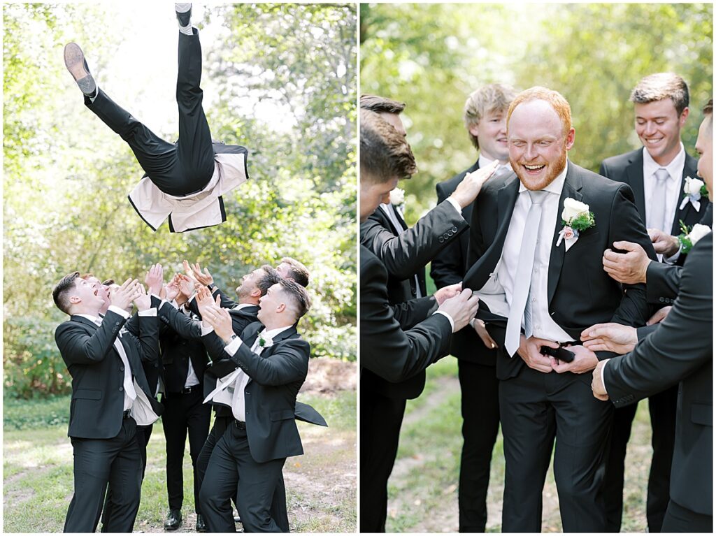 Groom being thrown in the air by groomsmen for vineyard wedding at koury farms