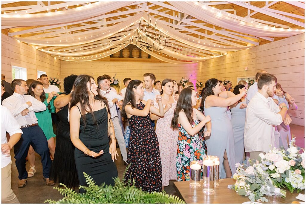 guests dancing at wedding reception