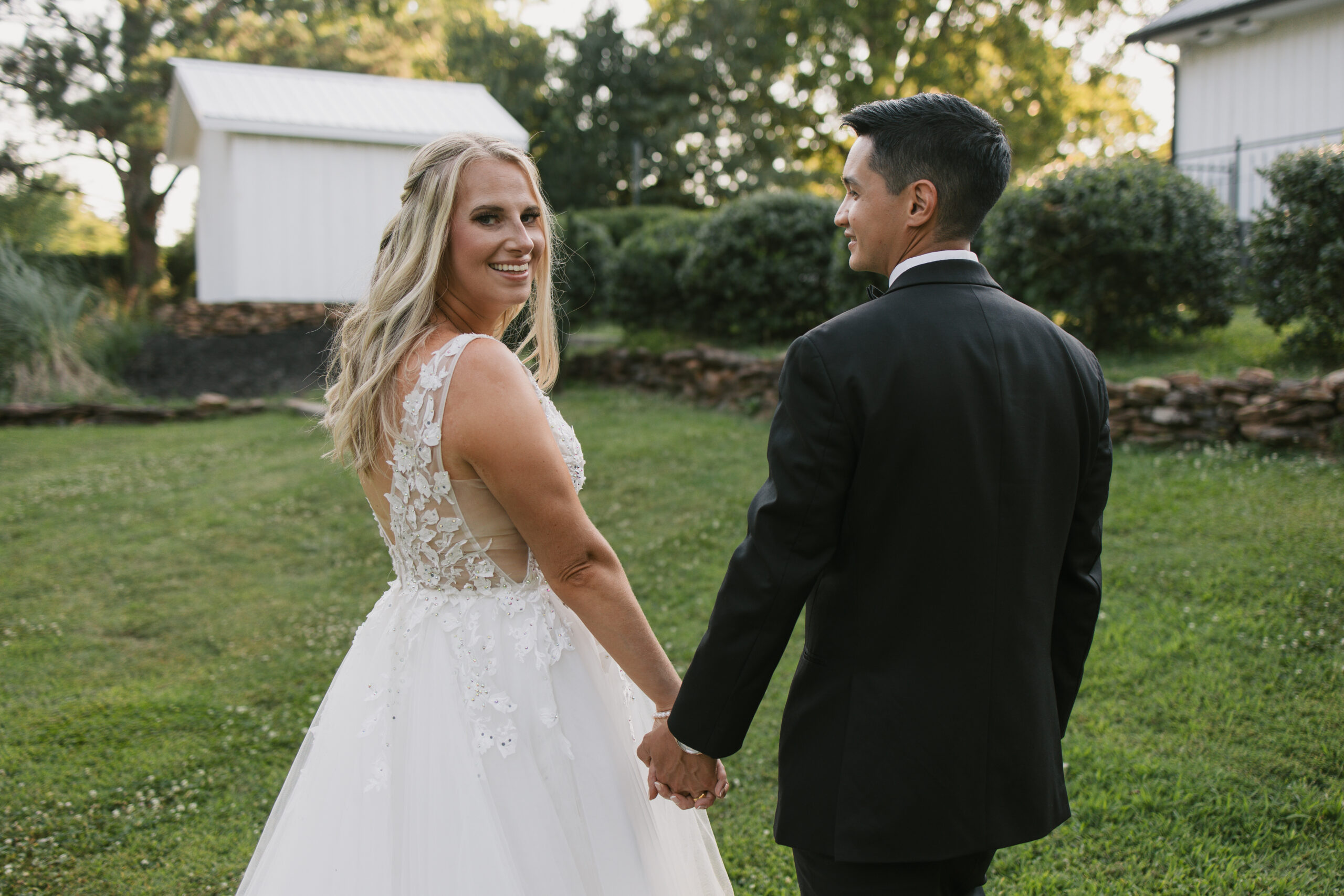 Bride and groom portraits in the grounds of Koury Farms