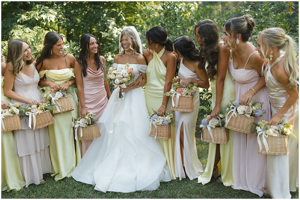 Bride with bridesmaids at elegant pastel wedding at Koury Farms, North Georgia