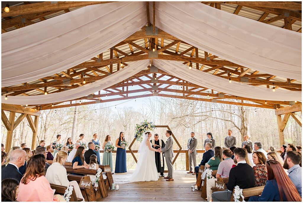 Wedding ceremony under the covered pavillion at Koury Farms