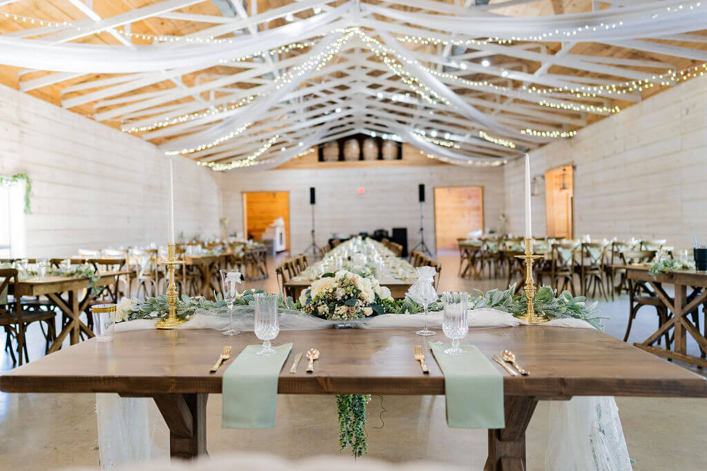 Elegant white barn reception space, one of the best photo spots at Koury Farms