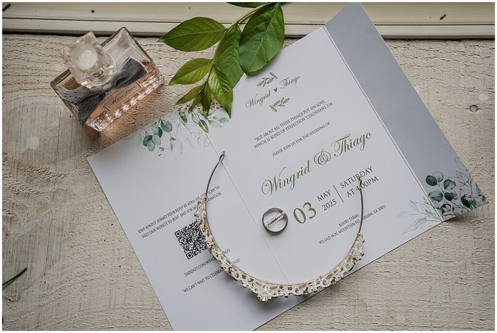 wedding details including invite, rings, crown