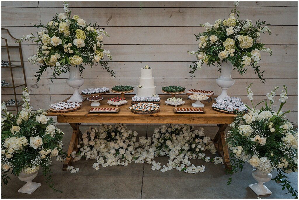 wedding cake table with floral inspiration