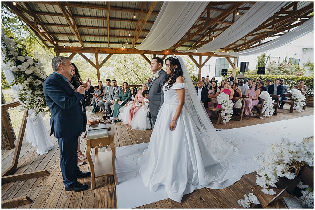 bride and groom at wedding ceremony at Koury Farms