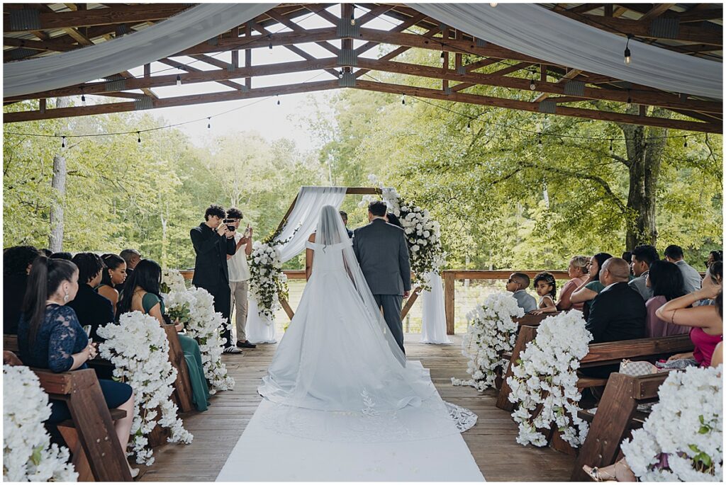 bride and groom at wedding ceremony at Koury Farms
