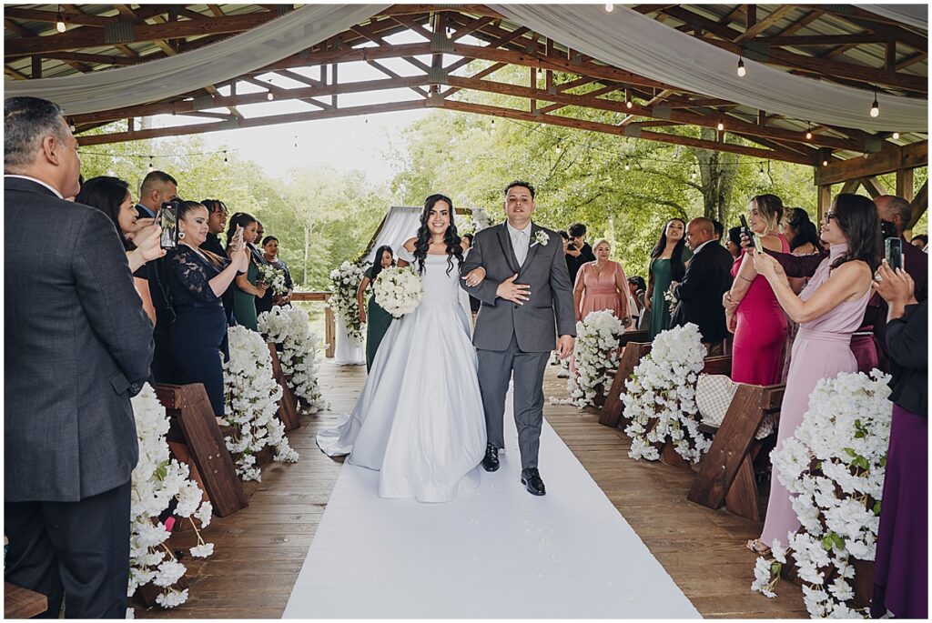 bride and groom at wedding ceremony at Koury Farms